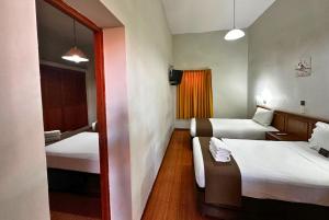Postel nebo postele na pokoji v ubytování DM Hoteles Mossone - Ica