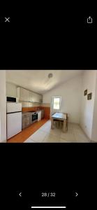 Η κουζίνα ή μικρή κουζίνα στο Njaro del Mar 17