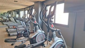 a row of exercise bikes in a gym at Skylux 3003 in Rio de Janeiro