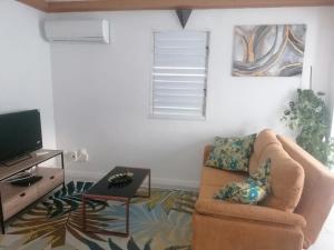 TV a/nebo společenská místnost v ubytování Charmant T3 idéal pour la famille + 1 fotografie