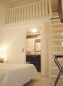 Postel nebo postele na pokoji v ubytování L'auberge Camarguaise