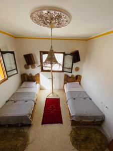 Voodi või voodid majutusasutuse Itri Surf Hostel Taghazout toas
