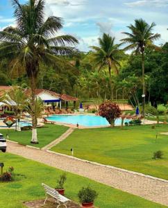 Bazén v ubytování Hotel Fazenda Cachoeiras de Cavaru nebo v jeho okolí