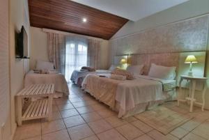 Postel nebo postele na pokoji v ubytování Hotel Fazenda Cachoeiras de Cavaru