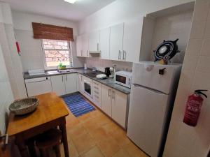 Kuchyň nebo kuchyňský kout v ubytování Sea & Sand Guest House