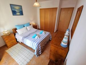 Postel nebo postele na pokoji v ubytování Sea & Sand Guest House