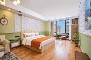 Letto o letti in una camera di 寓米公寓(琶洲会展中心广州塔店)