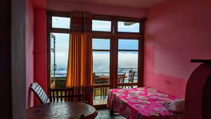 A bed or beds in a room at Cloudscape-Golkonda