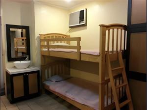 Postel nebo postele na pokoji v ubytování Hotel Mikka