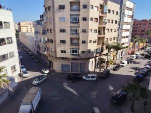 an aerial view of a parking lot in front of a building at casa bella in Casablanca