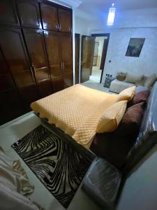 a bedroom with a large bed in a room at casa bella in Casablanca