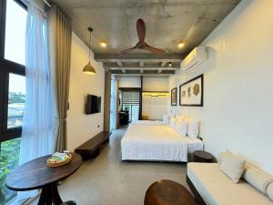 Postel nebo postele na pokoji v ubytování Eco & Rustic Home Hoian + 37 fotografií