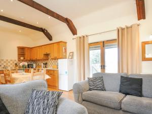 Kuchyň nebo kuchyňský kout v ubytování Barn Owl Cottage