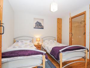 Postel nebo postele na pokoji v ubytování Barn Owl Cottage