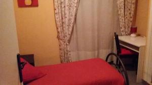 Postel nebo postele na pokoji v ubytování Albergo Sangrilà