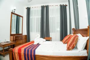 Postel nebo postele na pokoji v ubytování 64 ZENJ HOUSE Luxury AIRPORT HOTEL + 37 fotografií