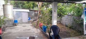 a garden with a garden rake in a yard at Paille en queue des z iles in Saint-Pierre