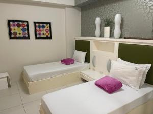Postel nebo postele na pokoji v ubytování Pico de loro Carola B + 3 fotografie