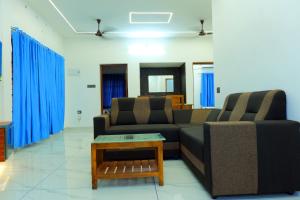 Sreeragam residency cherthala的休息区