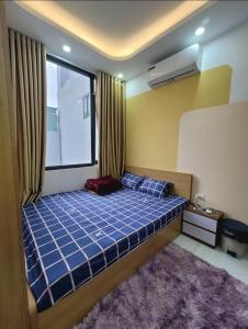 Postel nebo postele na pokoji v ubytování Phòng nghỉ đủ đồ