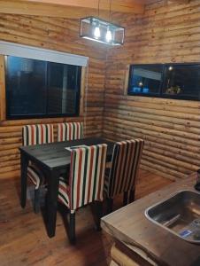 Un lugar para sentarse en Cabañas Olavarría 11 fotos más