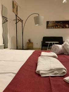 Posteľ alebo postele v izbe v ubytovaní 4 Season B&B Roma