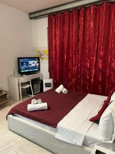 Posteľ alebo postele v izbe v ubytovaní 4 Season B&B Roma