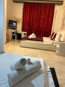 Posteľ alebo postele v izbe v ubytovaní 4 Season B&B Roma