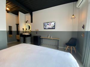 เตียงในห้องที่ Hotel NEXT