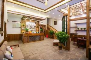 A seating area at Louzhongxiaoge Inn