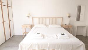 Voodi või voodid majutusasutuse ELENA APARTMENTS ITHACa toas