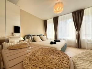 a bedroom with a large bed with a large rug at Premium Studio 300 m Grand-Place - hyper center Lille in Lille