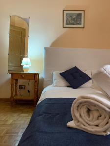 Posteľ alebo postele v izbe v ubytovaní 4 Season B&B Roma