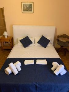 Posteľ alebo postele v izbe v ubytovaní 4 Season B&B Roma