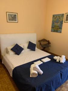 Posteľ alebo postele v izbe v ubytovaní 4 Season B&B Roma + 37 fotografií