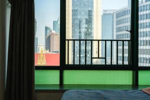Balkon lub taras w obiekcie Tech-X Jing'an Hotel