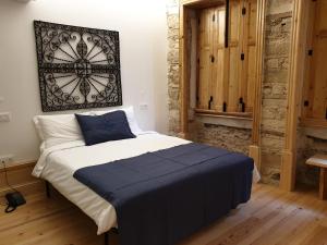 Postel nebo postele na pokoji v ubytování Casa da Baixa by PURUS