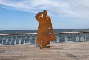 a statue of a person talking on a cell phone at Koserow Hotel Wald und Meer in Koserow +130 photos