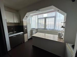 Una cocina o zona de cocina en Blue Sky Apartament