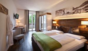 Postelja oz. postelje v sobi nastanitve Hotel ANDER
