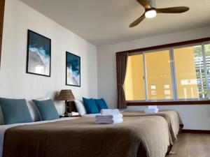 Ένα ή περισσότερα κρεβάτια σε δωμάτιο στο Painagama House