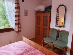 A bed or beds in a room at Apartment in Bodental near Ski Slopes