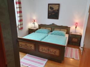 A bed or beds in a room at Apartment in Bodental near Ski Slopes