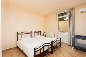 Posteľ alebo postele v izbe v ubytovaní Villa Callistemon