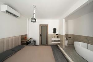 Postel nebo postele na pokoji v ubytování Zeus Living - Harmony Hideout