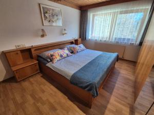 Postel nebo postele na pokoji v ubytování Haus Klammtal
