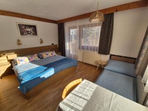 Postel nebo postele na pokoji v ubytování Haus Klammtal