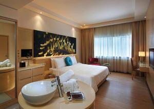 Postel nebo postele na pokoji v ubytování ANSA Hotel Kuala Lumpur