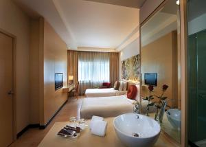 Postel nebo postele na pokoji v ubytování ANSA Hotel Kuala Lumpur