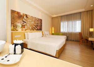 Postel nebo postele na pokoji v ubytování ANSA Hotel Kuala Lumpur